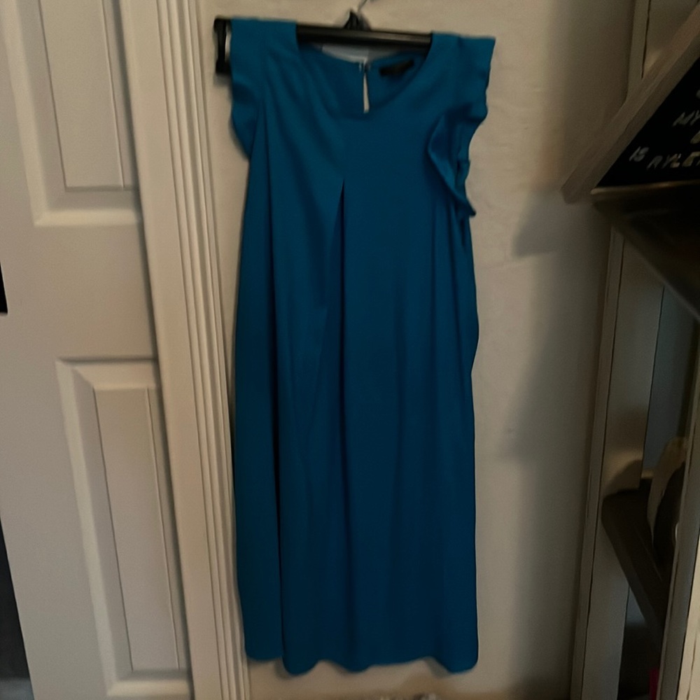 Blue silky dress with ruffles